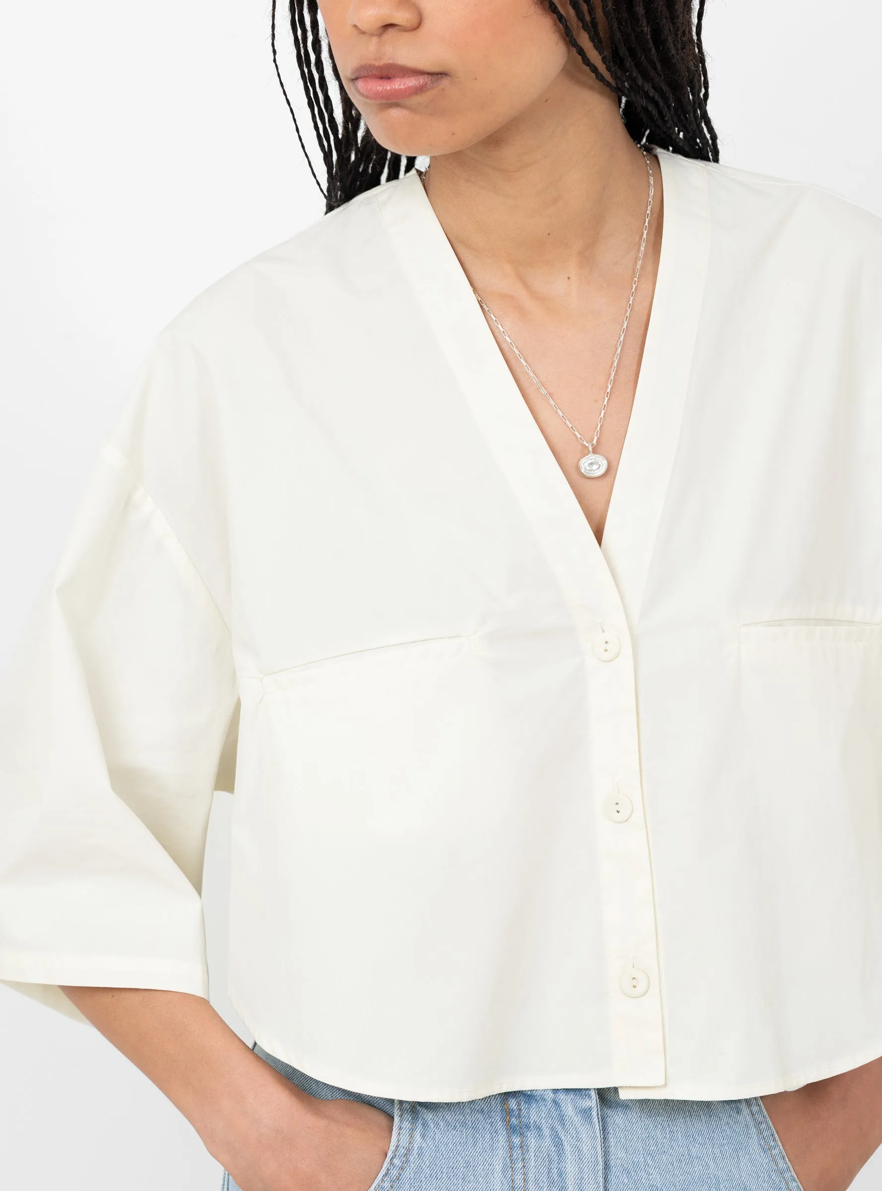 Circle Hem V-Neck Top Papyrus